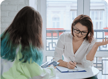 Woman evaluating a patient